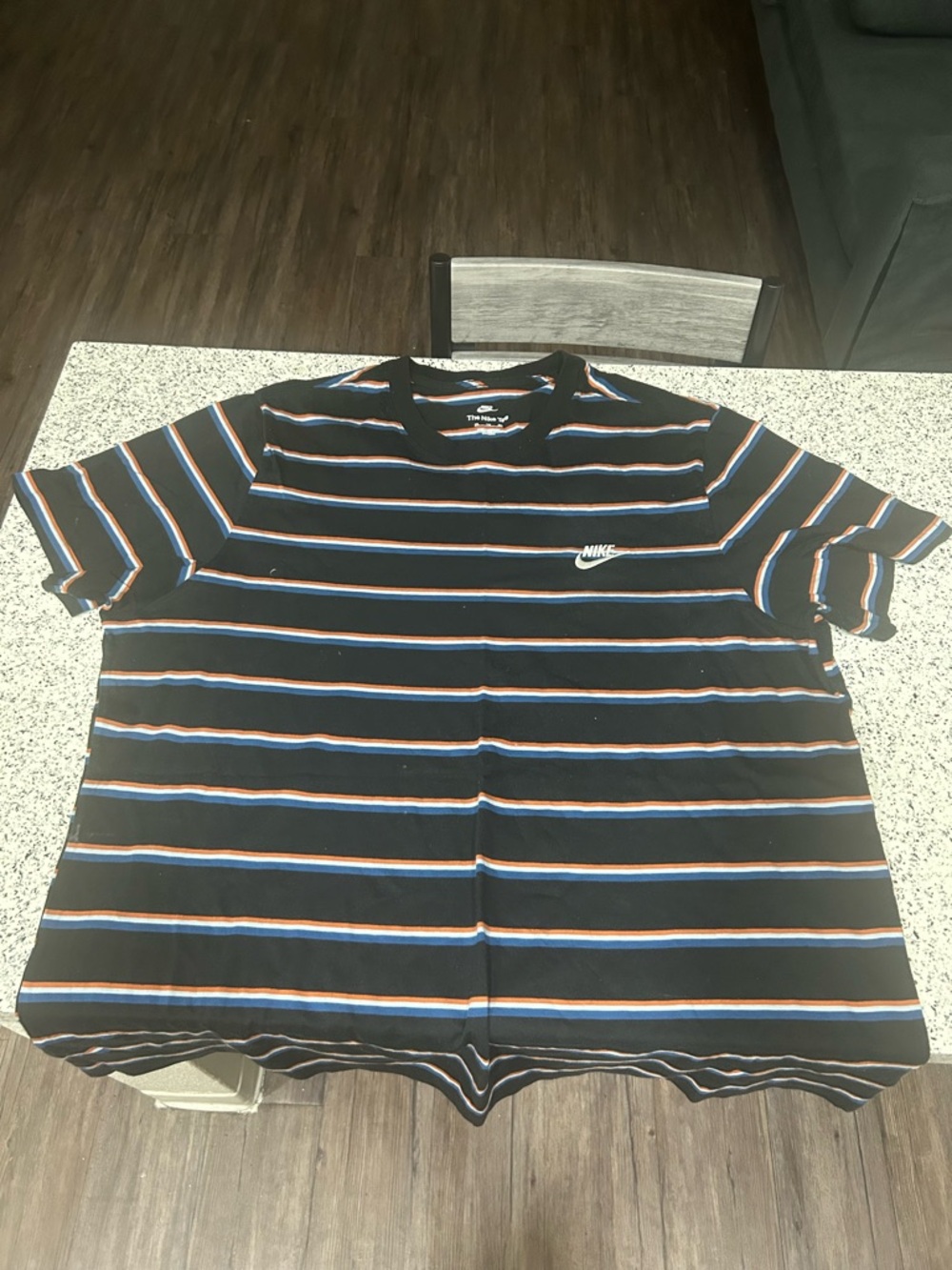 Nike Men's Black Crewneck Tee with Blue and Orange Stripes
